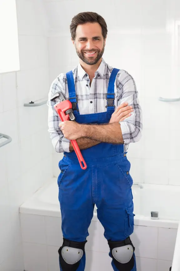 plumber smiling camera bathroom 47015811